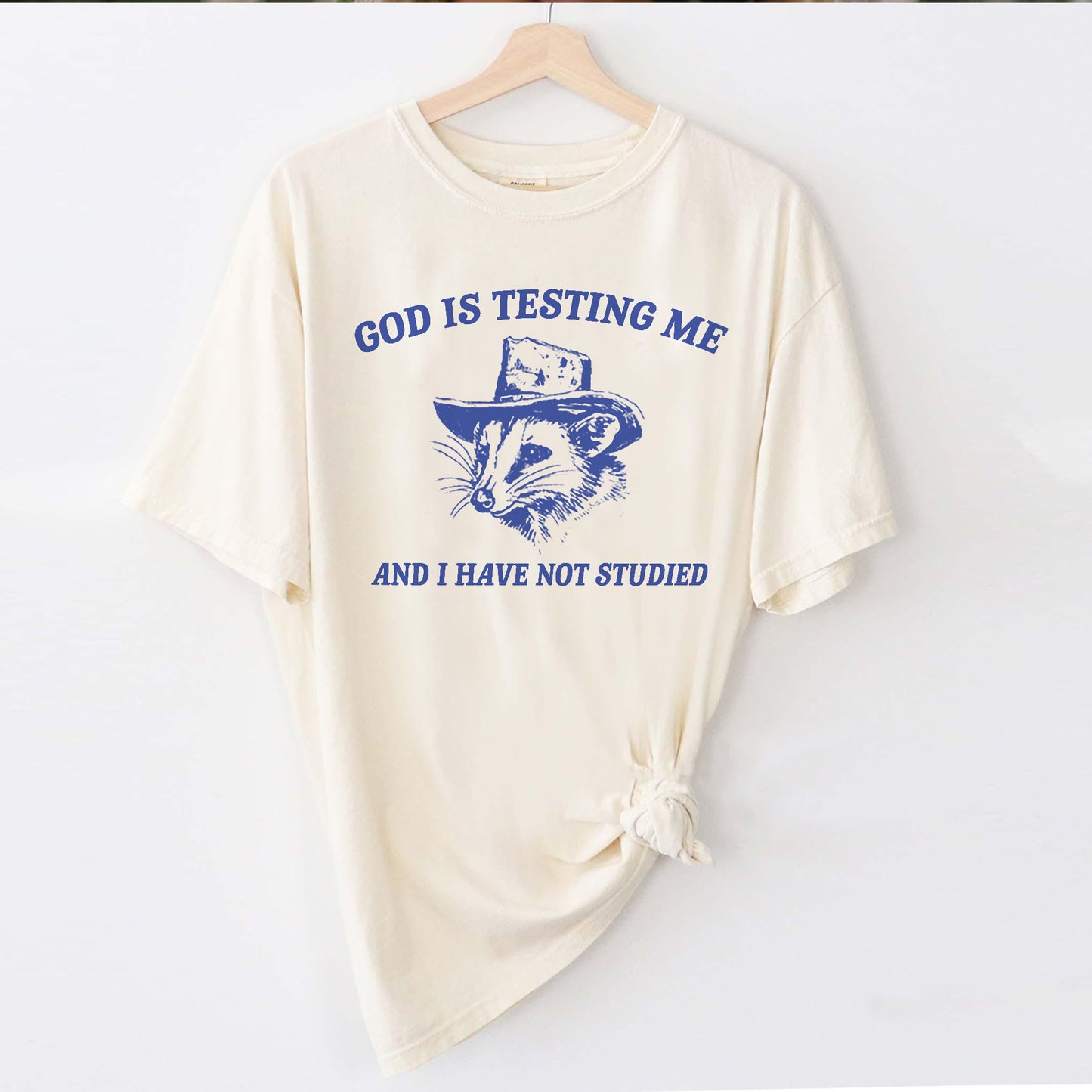 Funny Faith Shirt – God Is Testing Me and I Have Not Studied – Raccoon Meme Christian Tee – Natural – Up To 5XL