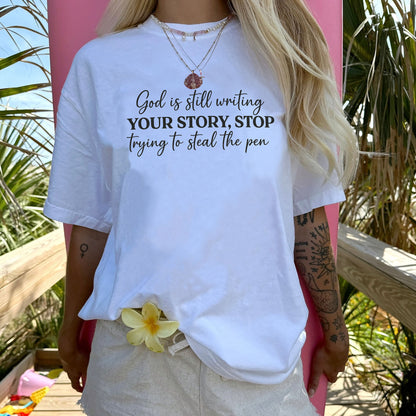 God Is Still Writing Your Story – Stop Trying To Steal The Pen T-Shirt   -  Funny Jesus Shirt For Christians- White- Up To 5XL