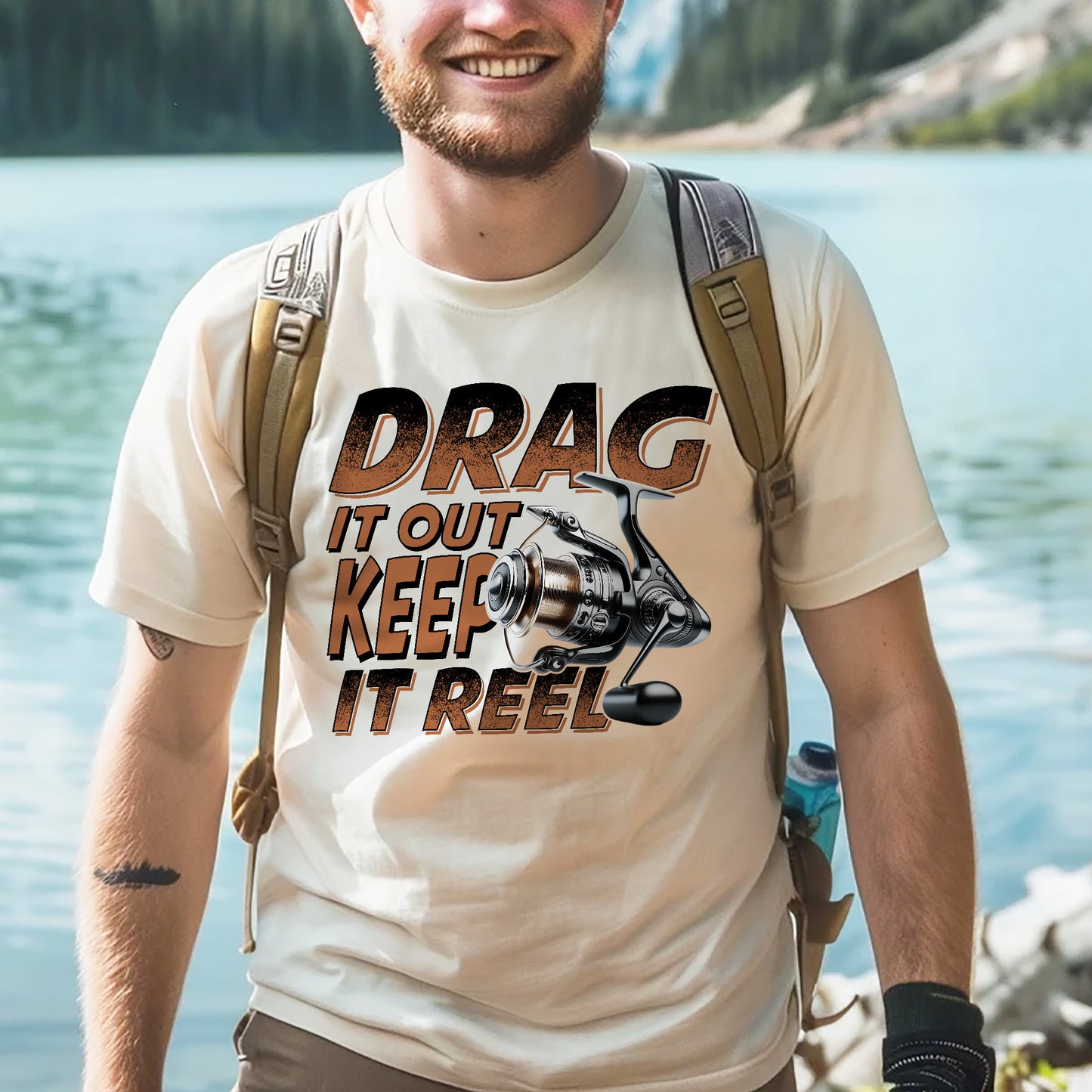 Fishing Pun Shirt – Drag It Out Keep It Reel Tee – Funny Angler Gift for Fishermen – Natural – Up To 5XL