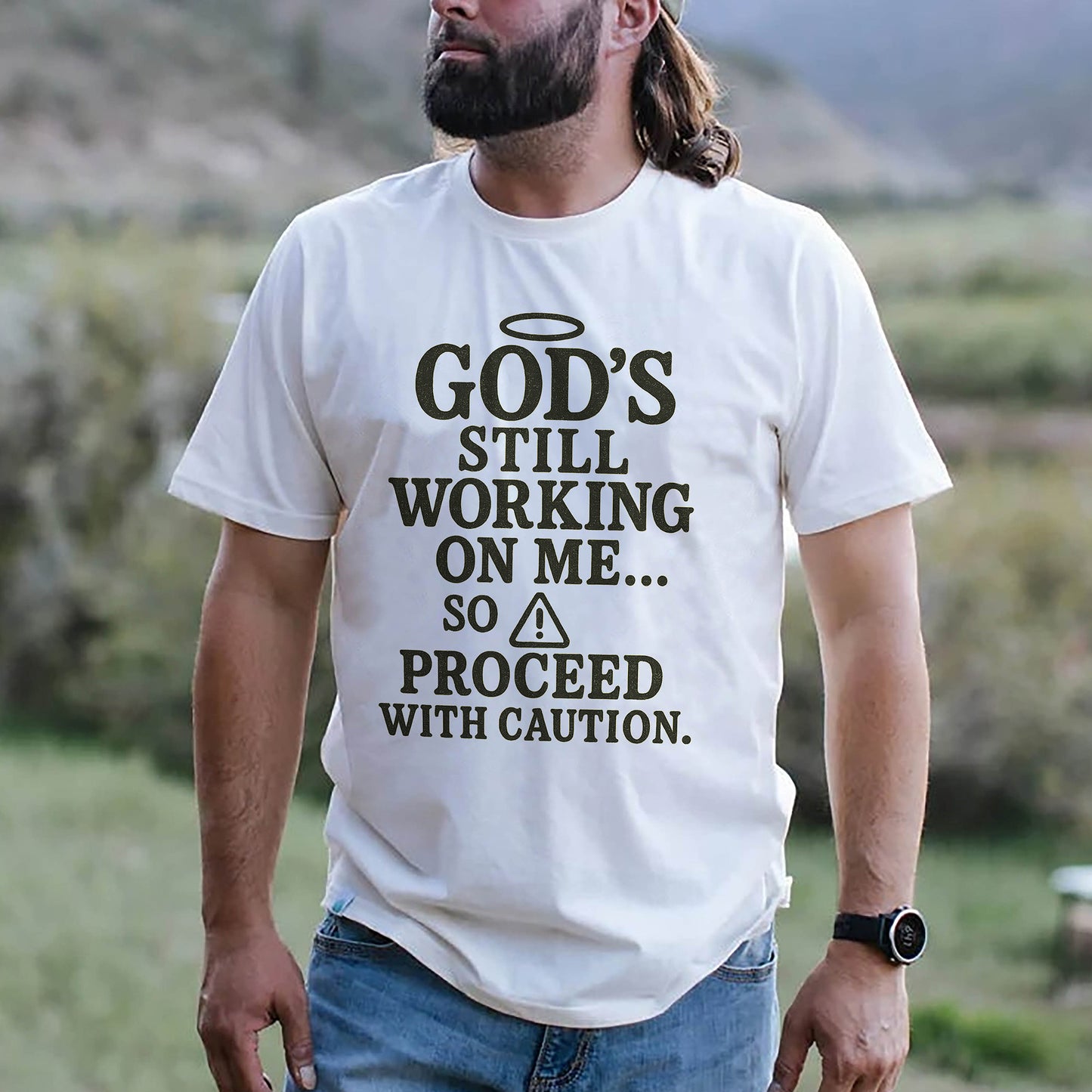 God’s Still Working On Me So Proceed With Caution T-Shirt   -  Funny Jesus Shirt For Christians- White- Up To 5XL