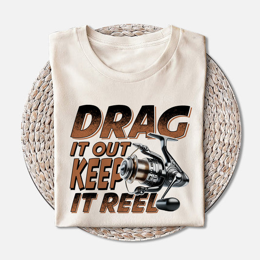 Fishing Pun Shirt – Drag It Out Keep It Reel Tee – Funny Angler Gift for Fishermen – Natural – Up To 5XL