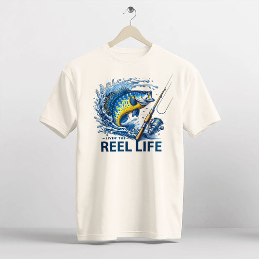 Funny Fisherman Shirt – Livin' The Reel Life Fishing Pun Tee – Humor Gift for Anglers – Natural – Up To 5XL